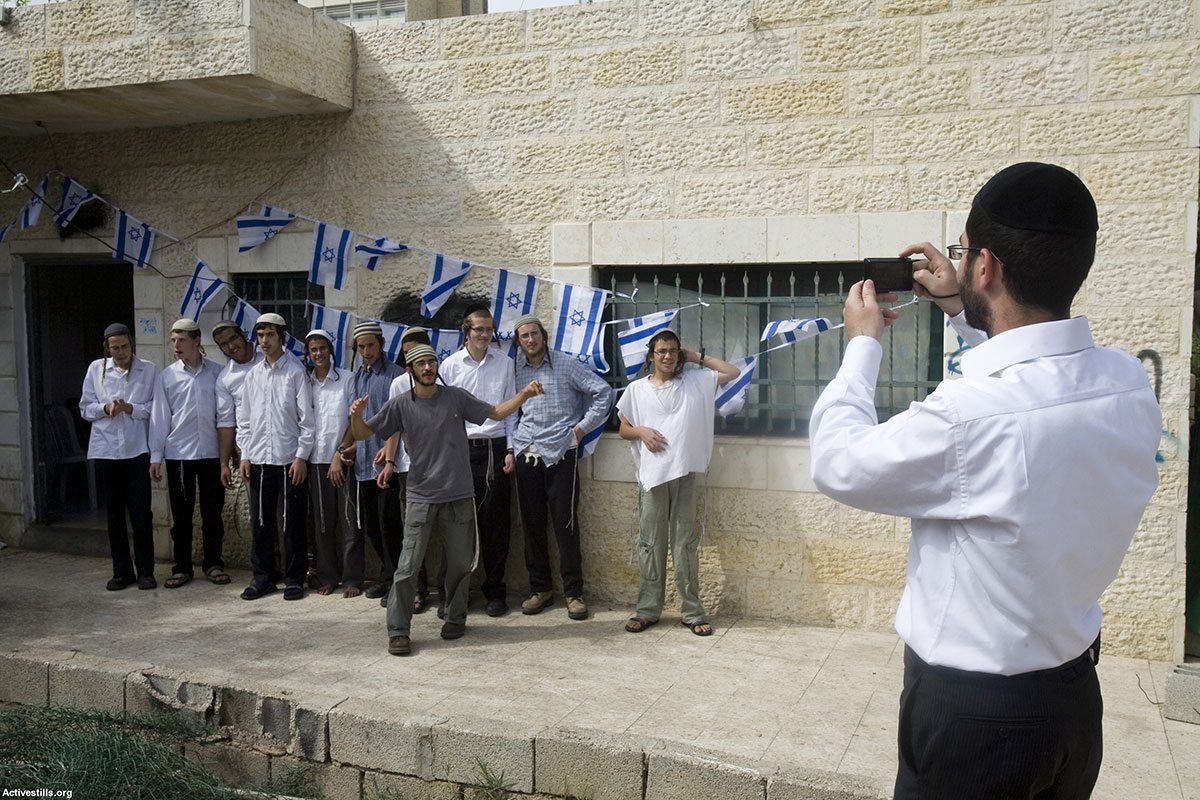 Radikale Siedler übernehmen ein Haus in Sheikh Jarrah, Ost Jerusalem, 2010. Foto: Activestills