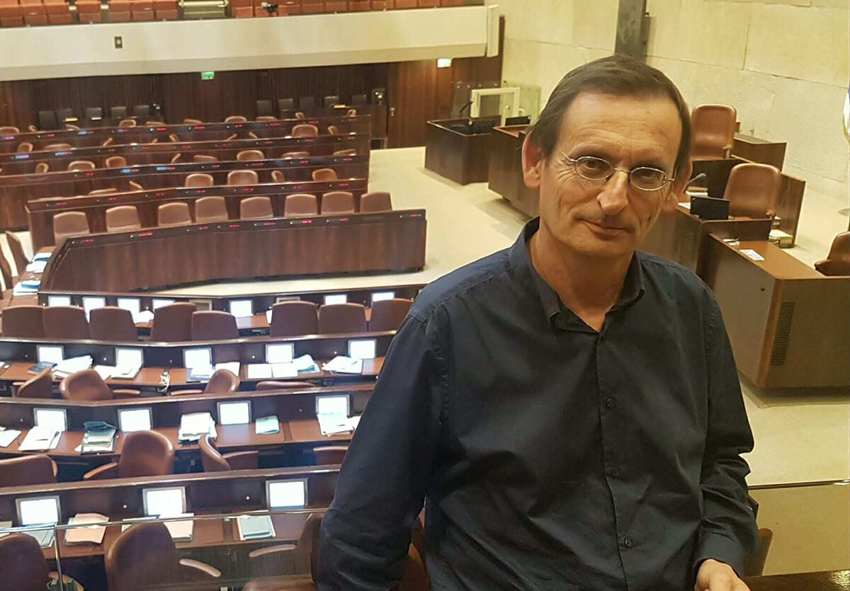 Dov Khenin in der Knesset. „Die Klimakrise ist eine viel größere Herausforderung als jeder nationalen Konflikt“. Foto: Ella Yedaya